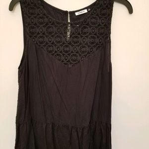 Very cute lace front frill bottom sleeveless top